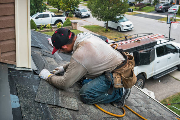 Professional Emergency Roof Repair technician working in Weems, VA